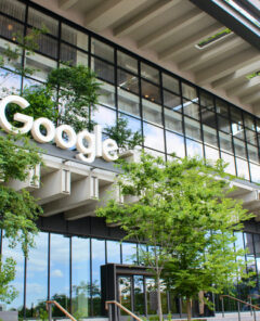 Green facade of the Google headquarters at St. John's Terminal in Hudson Square, NYC